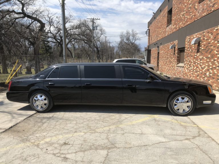 voyage funeral homes limo side