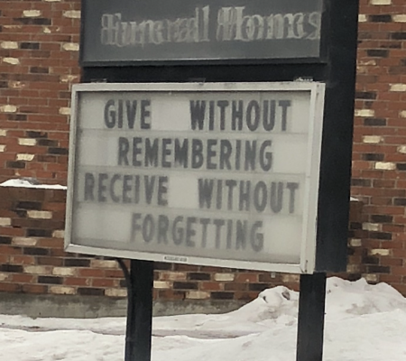 voyage funeral homes sign post